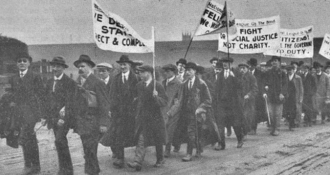 Demonstrators carry flags for justice