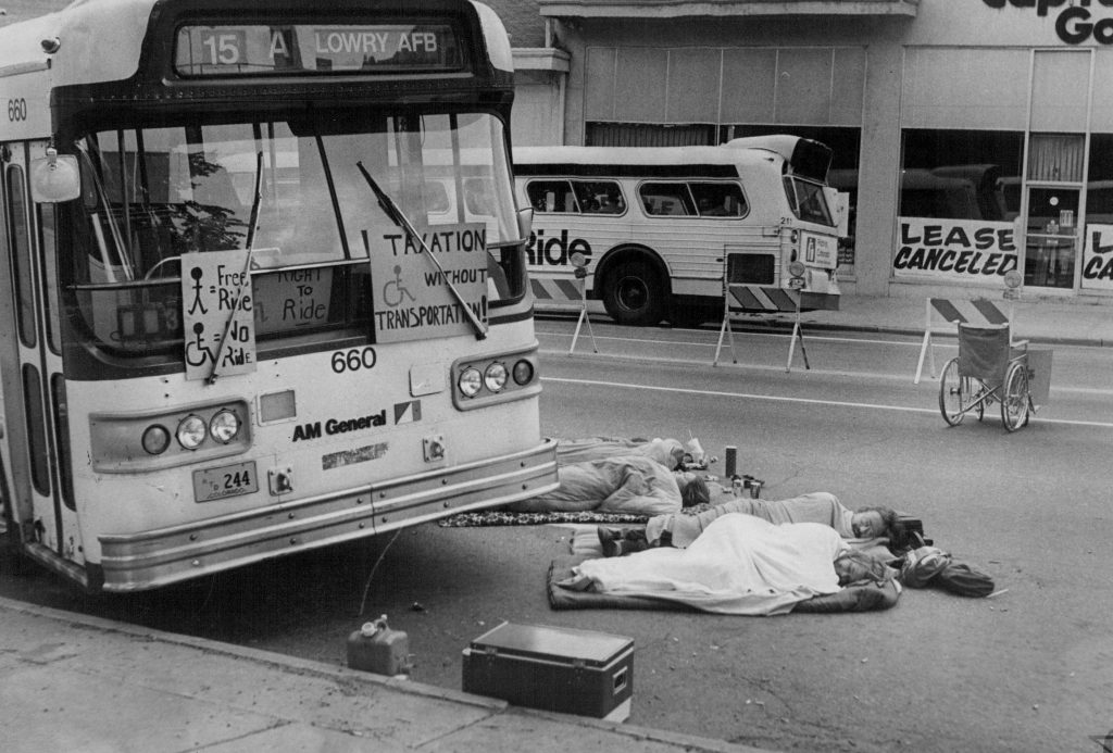 Protestors sleeping in front of public transportation